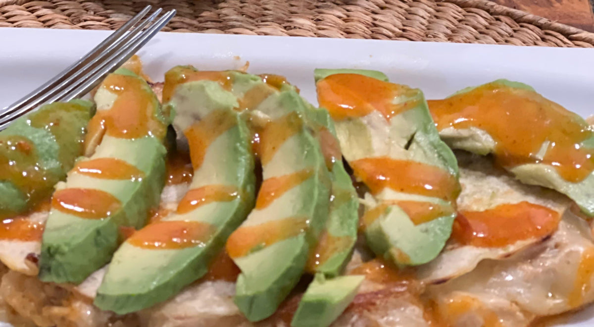 Hillbilly Avo-Chick Deluxe — saucy shredded chicken with avocado on crispy tortillas and Tennessee Bob's Wing Sauce