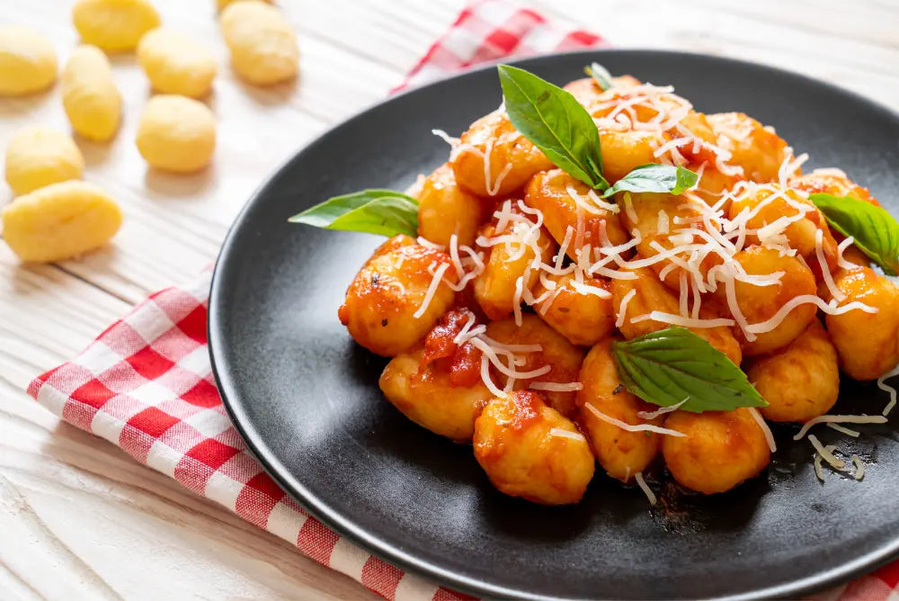 Homemade gnocchi in tomato cream sauce with Tennessee Bob's G Sauce and fresh basil